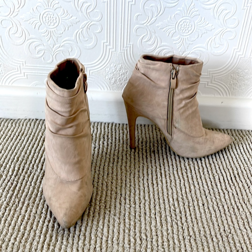 Lightly worn beige high heel booties